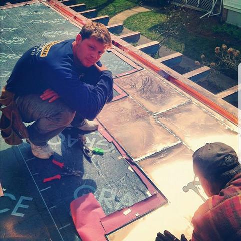 Brian and Tony are working on the roof, as you can part of the copper roof completed and the ice and water shield underneath, which acts as an extra barrier against water and ice damage. Each of these panels is carefully soldered together to create a clean seal throughout the roof.