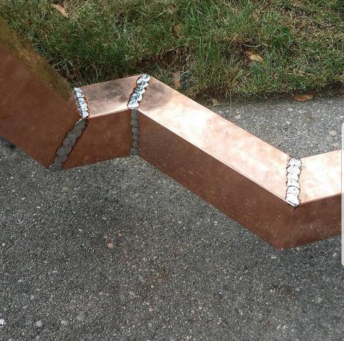 The key to a custom gutter like this is the soldering work that ties all of the copper together. This creates a watertight gutter which will allow the water to drain properly. This type of craftsmanship is something our crews pride themselves on.
