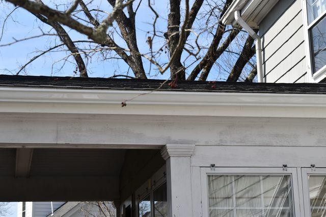 Installed aluminum gutters after removing rotting wooden gutters.