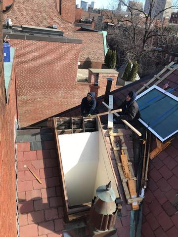 Our craftsmen close to finishing the work on the skylight in Boston, Massachusetts.

