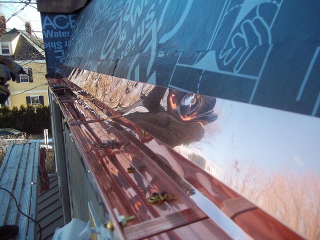The installation of the copper gutter has begun, with our crew making sure that the areas where the gutter attaches to the roof will be water tight.