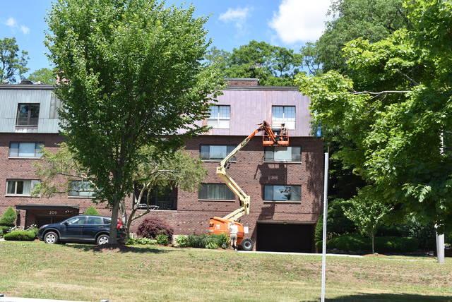 Installing copper panels on a three-story condo unit in Brookline, MA.

