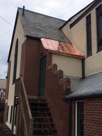 The new copper roof has been completely installed, and not only does it give the bulding a new look but will also make sure that this customer does not have to deal with leaks anymore.