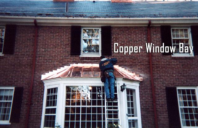 Shiny new copper roof for this bay window!