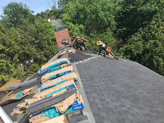 As we install the shingles, we do so in a pyramid pattern, which makes the roof much more durable. It also ensures there won't be visible lines running down the roof, which would be an issue if the shingles were installed in a perfect line.