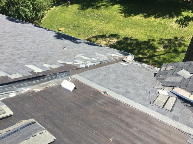 With part of this roof being on an addition, there is a drop between the two roofs. Our crew makes sure that this area is properly covered with ice and water shield as well.