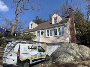 Asphalt shingle roof replacement in Needham, MA by roofing company.