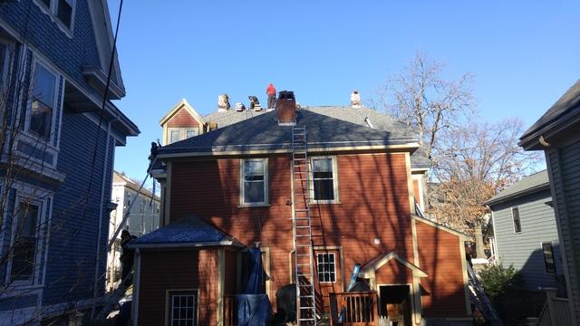 The old wood is removed and replaced to create a strong foundation for the new shingles.