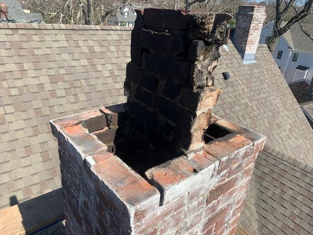This is the chimney before rebuild which shows the damage that weather and wear has caused.