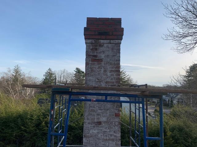 This is the chimney after our rebuild which shows clean mortar joints and strong bricks that can withstand any weather or debris that could cause damage or deterioration.