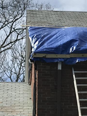Protecting the roof and home from the elements while we prepare our restoration on this roof.