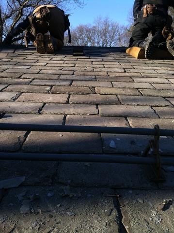 The slates have been installed, and the ice rail as well. The only thing left for our crew to do is clean up the job site. The homeowner will now benefit from not only a leak free roof, but one that will keep the heat in too.