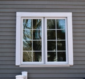 Needham window replacement by roofing company.