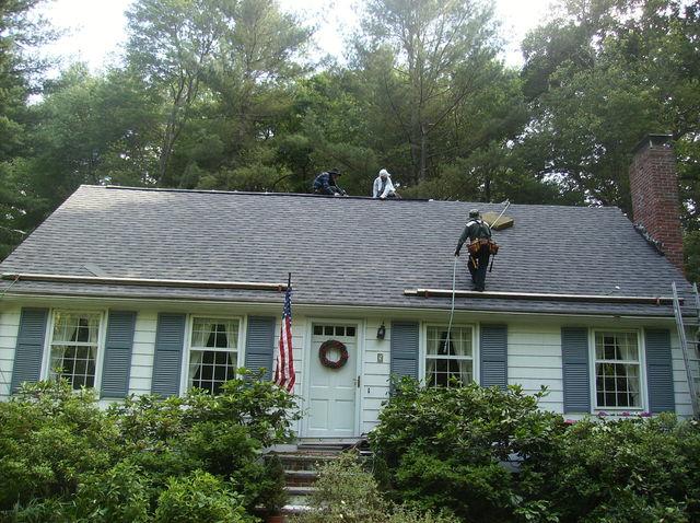 The new shingles have been installed and this roofing project is complete. All that's left is a little cleanup and this new roof will be good to go.