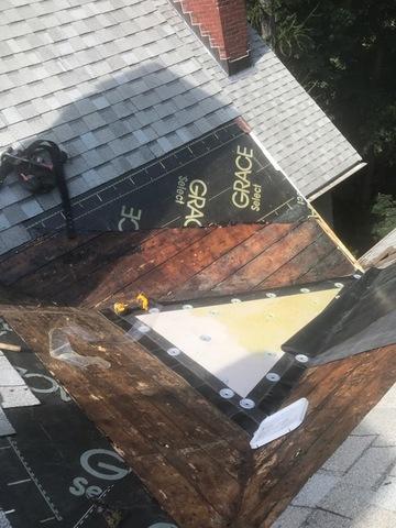 The old rubber has been removed, and this section of the roof is ready for the new rubber to be applied.