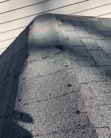 This is the before ridge on the roof that lacked ventilation. For our installation, we installed a copper ridge ventilation to make sure the roof is properly ventilated.

