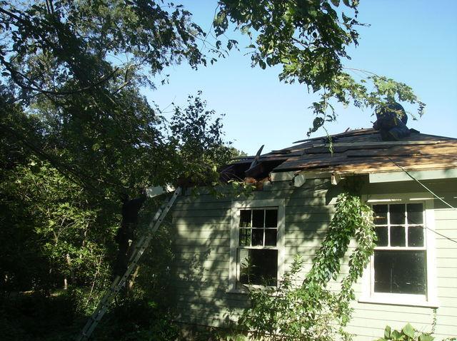 With the shingles stripped back, our crew can see the damage to the rafters coming off the roof. This shows us how severe the damage is, and lets our crew know exactly how much of he roof needs to be rebuilt.