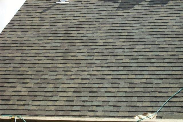 With the shingle roof installed, a close up shows the new shingles on the roof. With the job completed, this customer will not have to worry about leaks again.