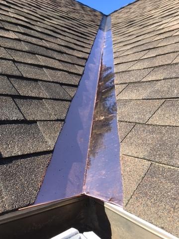 The copper valley on this shingle roof has been completed, bringing this project to a close.