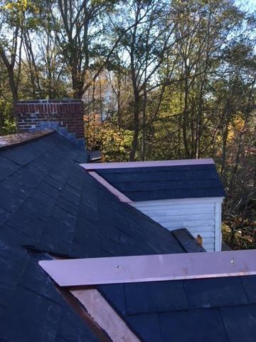 This project has come to a close with the copper cleanly installed along the peaks of the dormers, creating a watertight seal with the slates.