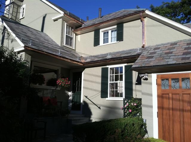The slates and copper have been installed by our expert crew, and this homeowner won;t have to deal with leaks again any time soon.