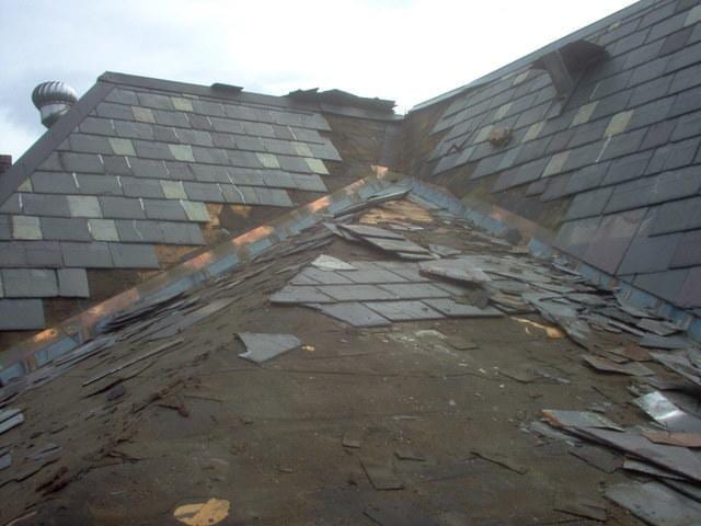 Our crew begins this project by removing all of the damaged slates, keeping only those that can be reused once they begin replacing the slates.