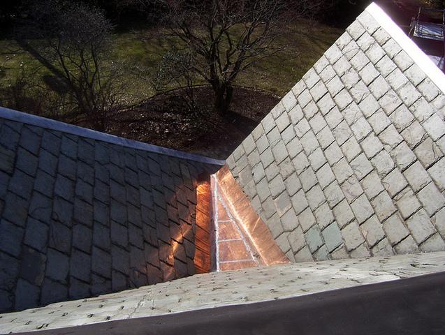 Here we replaced the slate roof and installed new copper valleys and ridges.