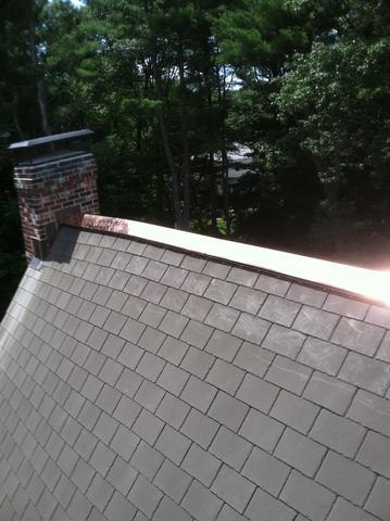 Brand new copper ridge ventilation after being installed.