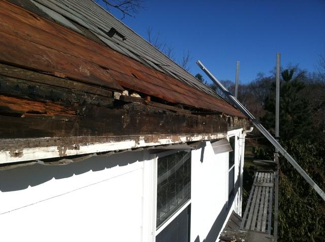 The crew starts by removing the slates to expose the damaged area of the roof, showing the full extent of the damage.