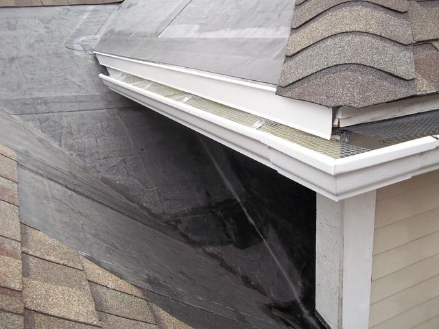 Membrane roof material allows snow to glide towards bottom of roof.