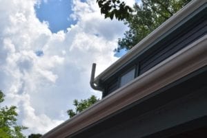 Wood gutter installation.