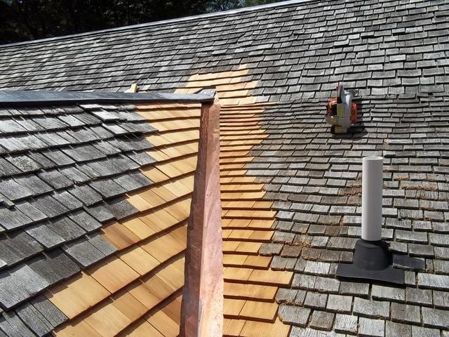 Copper valley on wood shingle roof.