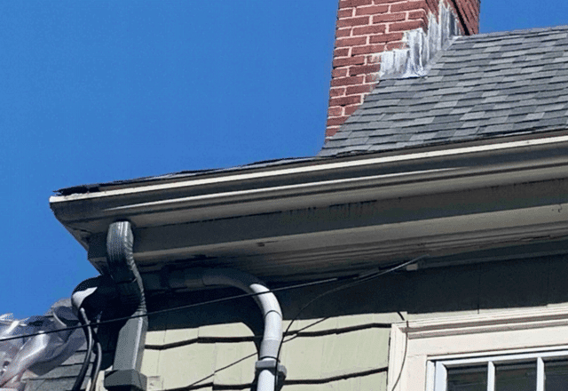 Rotting wooden gutters causing leaks.