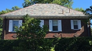 Slate roof installation by roofing company.