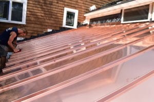 Copper panels installed by roofing company in Newton, Wellesley, Brookline, and Needham.
